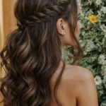 Stunning prom hairstyles including updos and half-up styles for 2025.