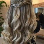 Best prom hairstyles for 2025 including elegant updos and half-up styles.