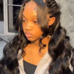 Body wave human hair wig for Black women, styled for natural, voluminous looks.