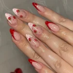 Colorful strawberry nail art showcasing bold design ideas