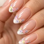 Elegant Floral French Tip Almond Nails for a spring manicure