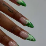 Elegant green nail designs suitable for a professional work environment.