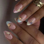 Lemon nail design featuring vibrant citrus colors and patterns.