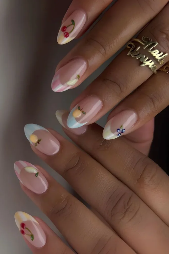 Lemon nail design featuring vibrant citrus colors and patterns.