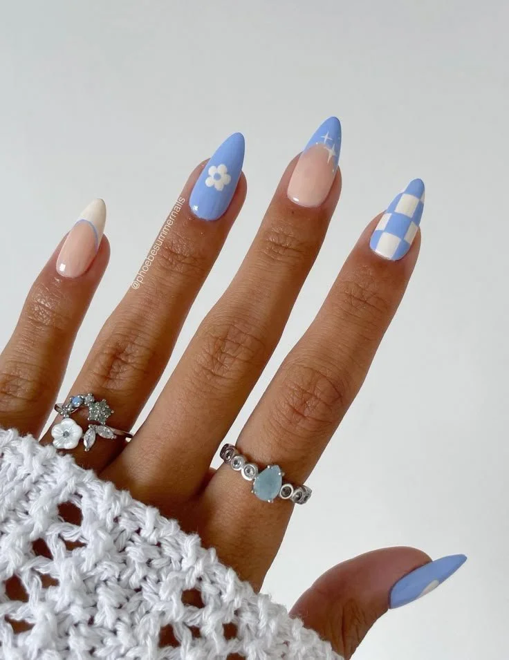 Beautiful light blue nails with trendy designs for a stylish season