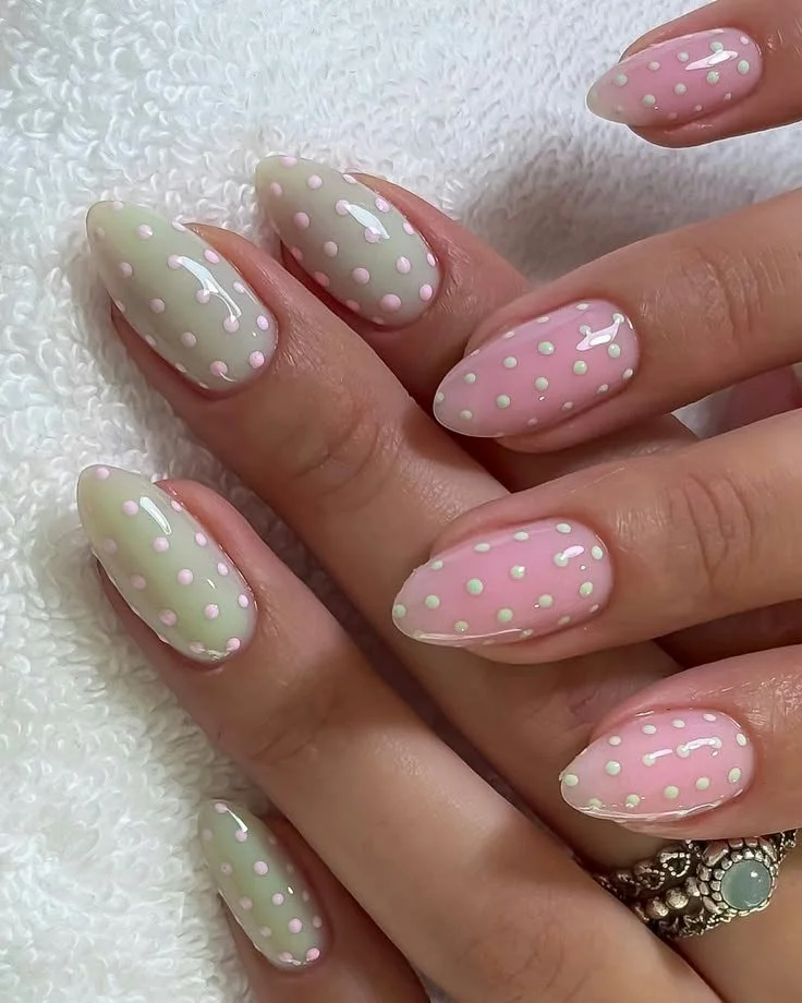 Spring 2026 nail art trends showcasing sequined floral designs and mob wife inspiration.