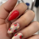 Colorful spring fruit nail designs for 2026 featuring various fruit patterns.