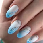 Beautiful summer blue nails inspired by ocean waves for mom's stylish look