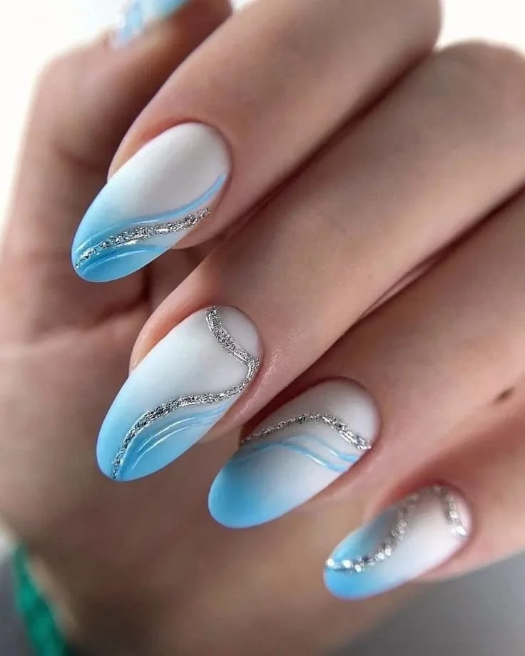 Beautiful summer blue nails inspired by ocean waves for mom's stylish look