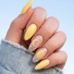 Butter yellow pastel celestial nails showcasing spring 2026 trends
