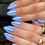 Stylish white and blue abstract art nails for moms