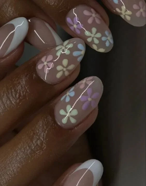 Colorful back to school nail art featuring cute flower designs for girls.