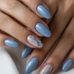 August 2025 nail color ideas featuring blueberry branches and baby sky shades.