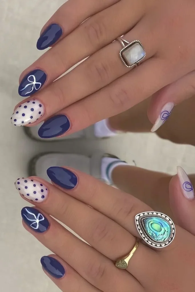 Elegant blue and white nails showcasing a trendy color combination.