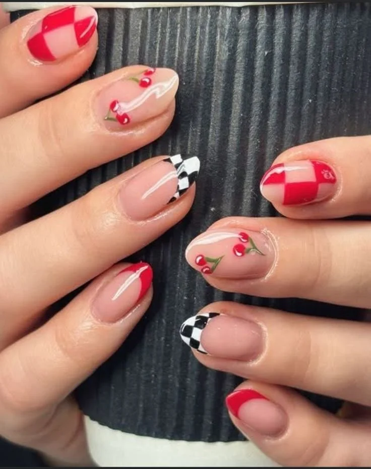 Elegant checkered nails featuring French styles and cherry red designs.