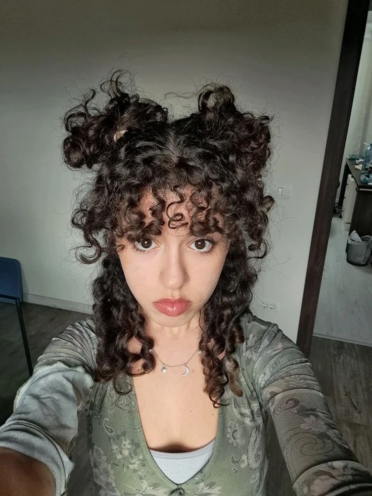 Curly hair styles featuring side bangs for medium and long hair