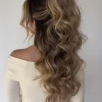 Voluminous half up hairstyle tutorial for moms featuring easy techniques.