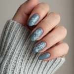 Elegant grey nails design featuring minimalist white flowers