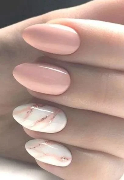 Pink marble effect gel nails for young ladies showcasing elegant nail art design.