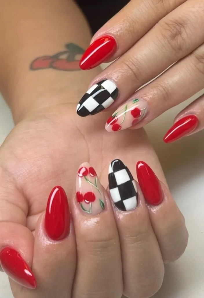 Chic summer red cherry nails aesthetic with vibrant designs and glossy finish.