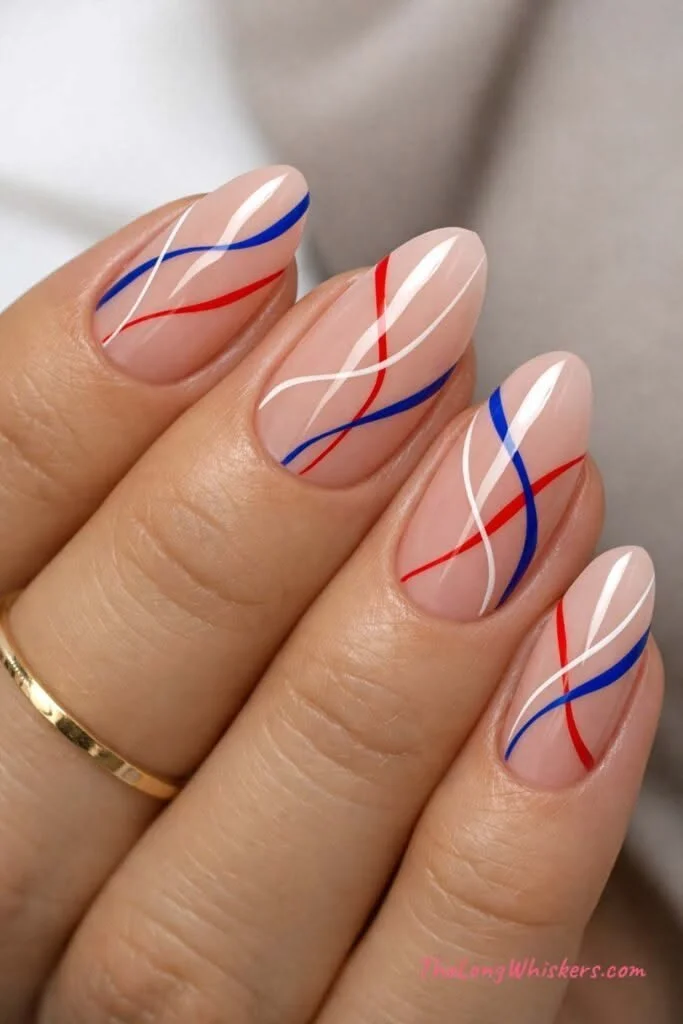 Elegant 4th of July nail designs with fireworks and patriotic colors