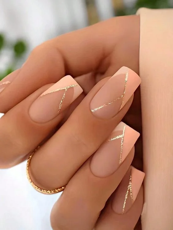 Trendy short square nail art designs featuring sparkling jewelry accents.