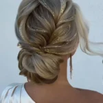 Bridal hair featuring long half-up wedding hairstyles inspired by Gatsby styles.