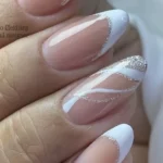Elegant white nail inspiration for brides with gel French tips