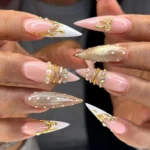 Elegant 3D Gold Swirl French Tip Press On Nails with piercing nail rings.