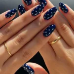 Stylish polka dot nails design in vibrant colors for a fun look
