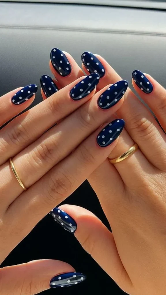 Stylish polka dot nails design in vibrant colors for a fun look