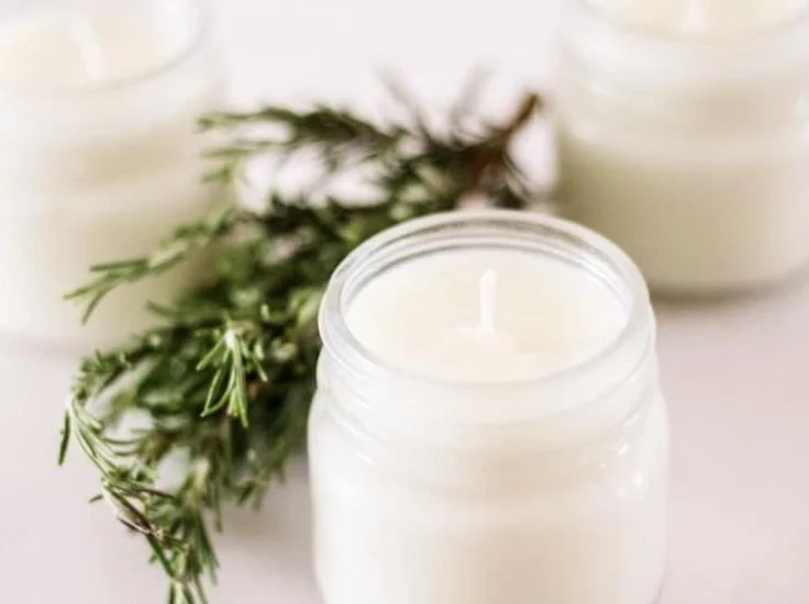 Soy rosemary mint candle providing cozy ambiance for busy moms.