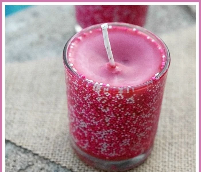 Homemade pumpkin spice soy candles decorated for autumn ambiance