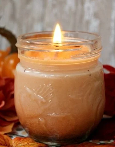 Homemade pumpkin spice soy candle for a cozy autumn ambiance
