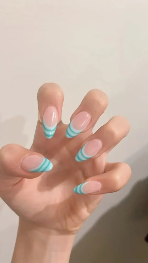 Colorful and creative striped nails design showcasing vibrant nail art ideas.