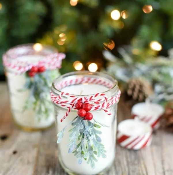 Homemade DIY peppermint mason jar candles with holiday decorations