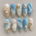 Ocean blue seashell nails design for busy moms