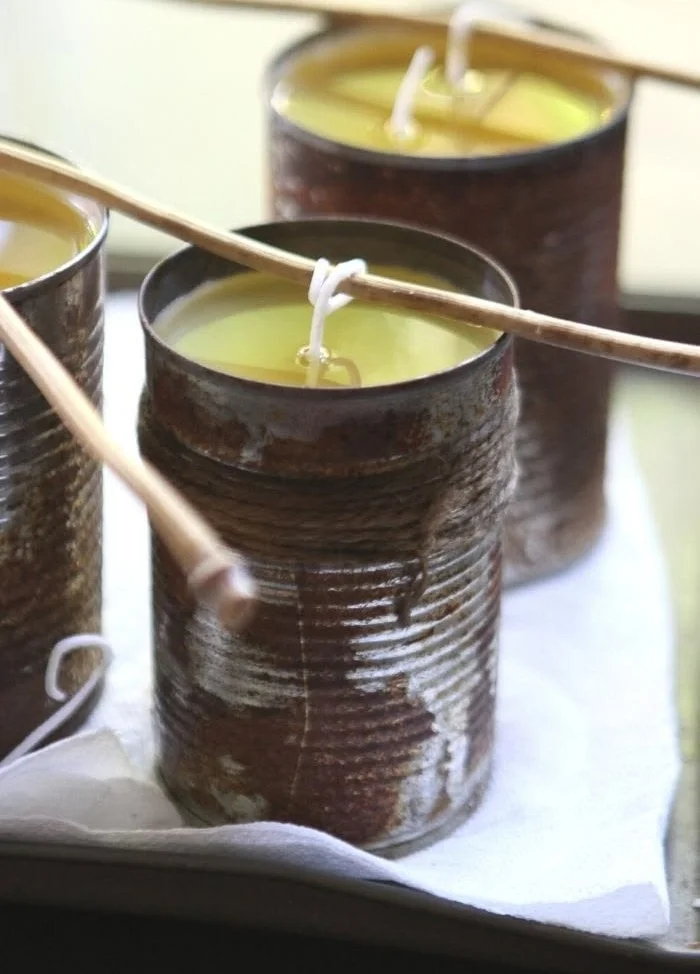 Homemade citronella candles for outdoor use to repel bugs and create a peaceful atmosphere.