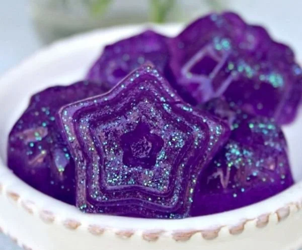 Colorful jiggly jelly soaps made at home with DIY recipes and ingredients.