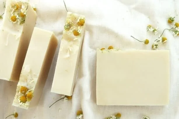 Homemade chamomile soap bar for soft and calm skin, perfect for moms.