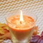 Homemade pumpkin spice candles for fall decoration and fragrance.