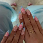 Vibrant Tropical French Nails featuring colorful tips and tropical-themed designs
