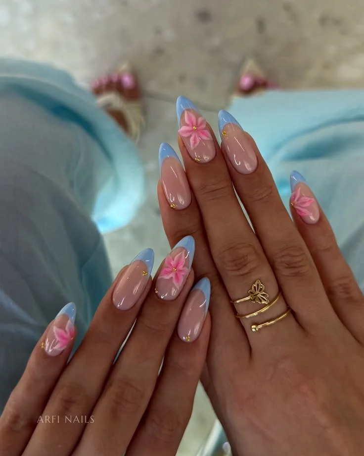 Vibrant Tropical French Nails featuring colorful tips and tropical-themed designs