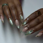 Chic cat-eye nail designs showcasing shimmer and elegance