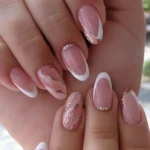 Elegant white and gold nail designs for 2025 inspiration