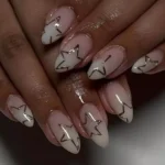 Elegant New Year's nail designs featuring shimmery tips, mixed metals, and French lace.