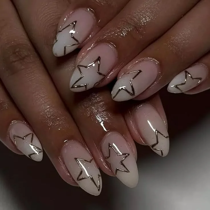 Elegant New Year's nail designs featuring shimmery tips, mixed metals, and French lace.