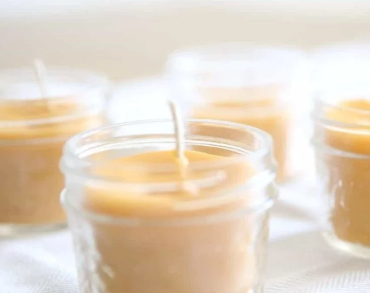 Homemade beeswax candles in various shapes and sizes