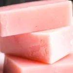 Homemade moisturizing cold process soap in various colors and shapes.