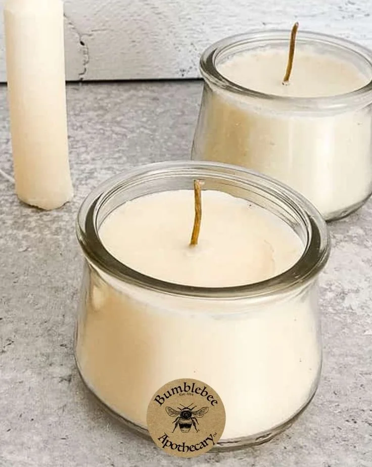 Handmade DIY aromatherapy candles with tallow and essential oils.